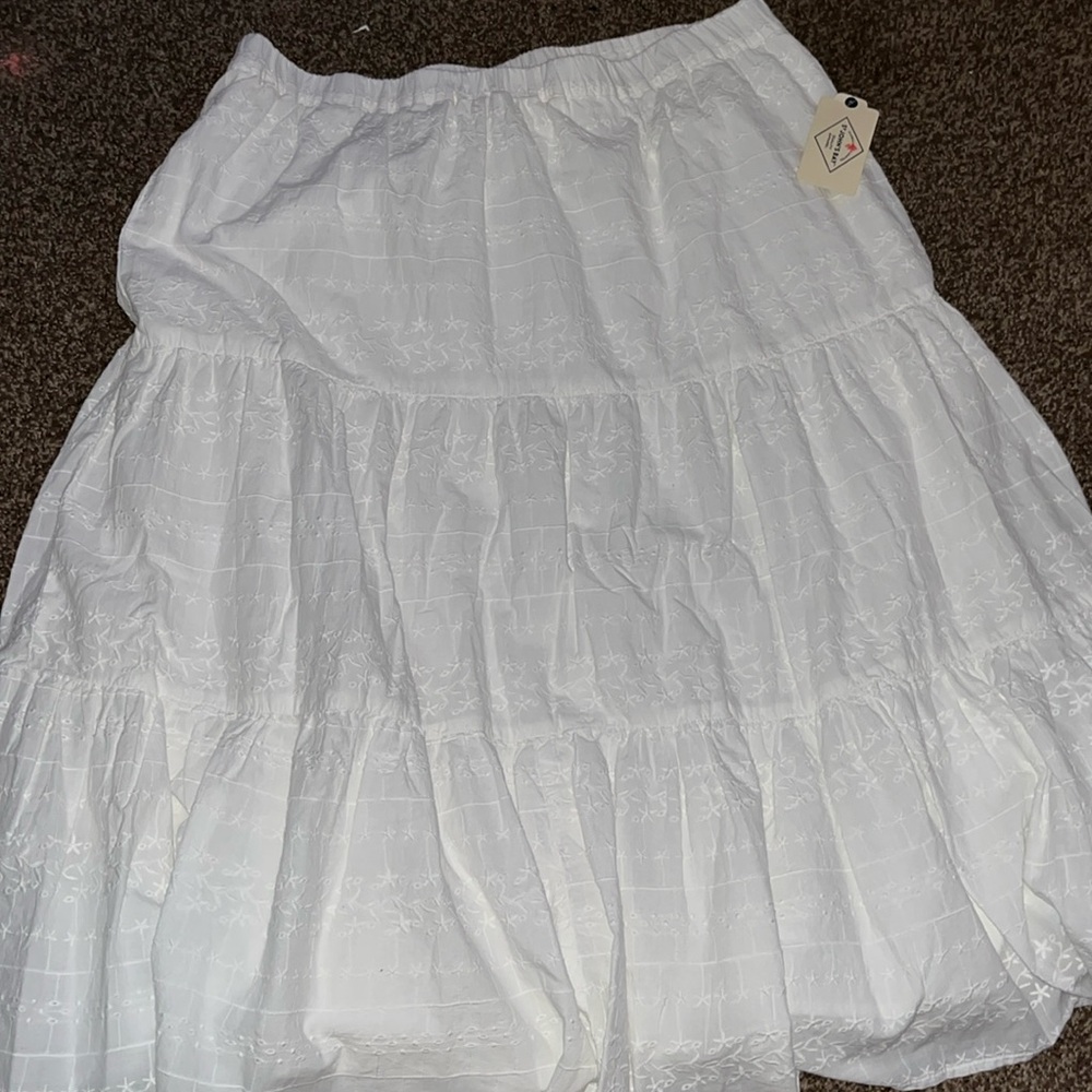 Bought from JcPenneys, midi white skirt with flower patterns